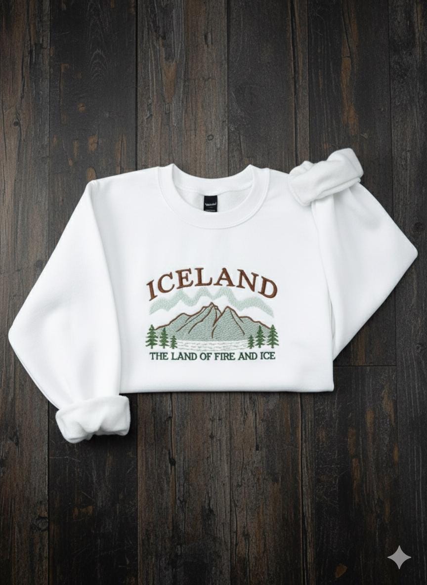 Iceland Embroidered Sweatshirt, Land of Fire and Ice Crewneck, Nordic Travel Sweater, Adventure Gift, Cozy Winter Travel Shirt