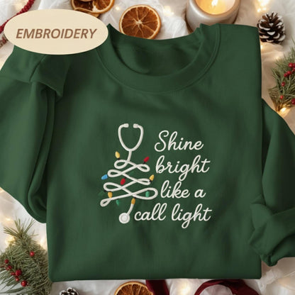 Embroidered Shine Bright Like A Call Light Shirt, Christmas Nurse Shirt Stethoscope Xmas Nurse Tree Pullover Merry Nurse Christmas Crewneck