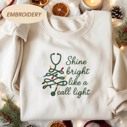 Embroidered Shine Bright Like A Call Light Shirt, Christmas Nurse Shirt Stethoscope Xmas Nurse Tree Pullover Merry Nurse Christmas Crewneck