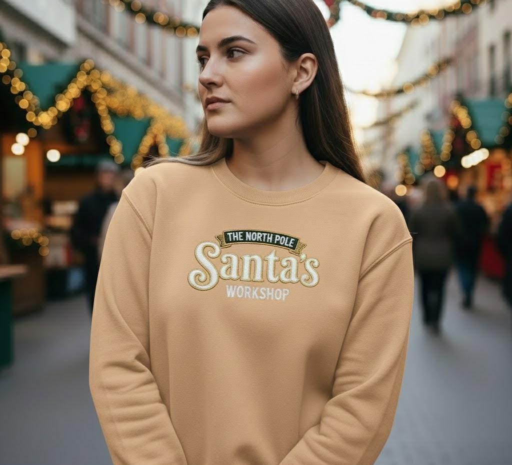 Santa’s Workshop Embroidered Sweatshirt | North Pole Christmas Jumper | Santa’s Crew Holiday Sweater | Festive Embroidery Pullover