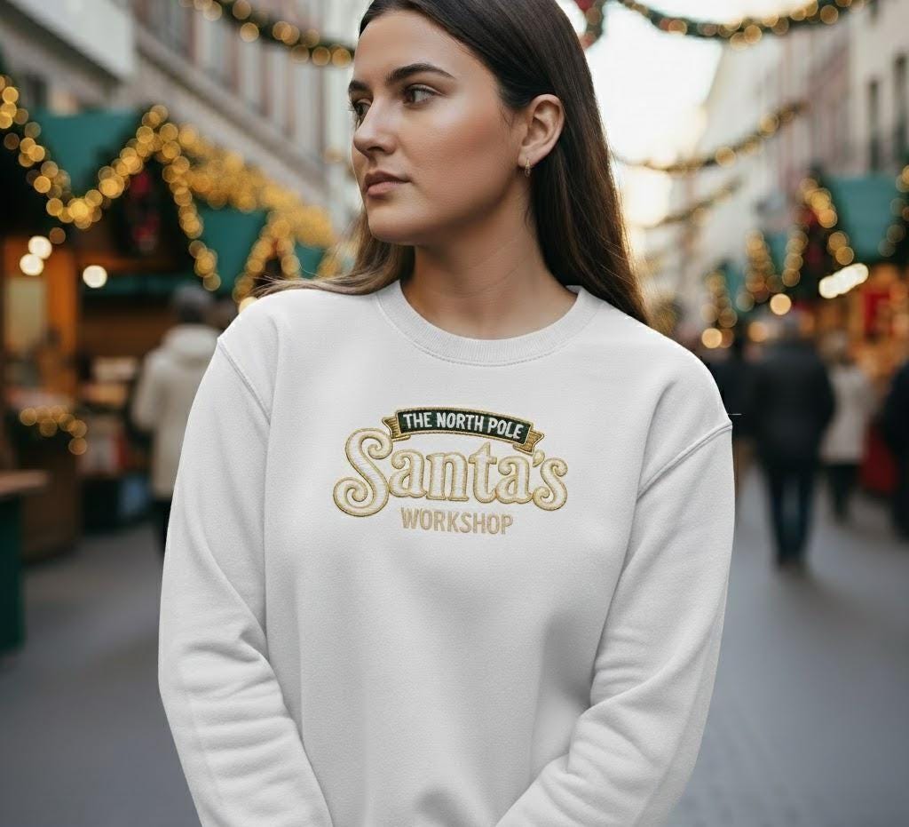 Santa’s Workshop Embroidered Sweatshirt | North Pole Christmas Jumper | Santa’s Crew Holiday Sweater | Festive Embroidery Pullover