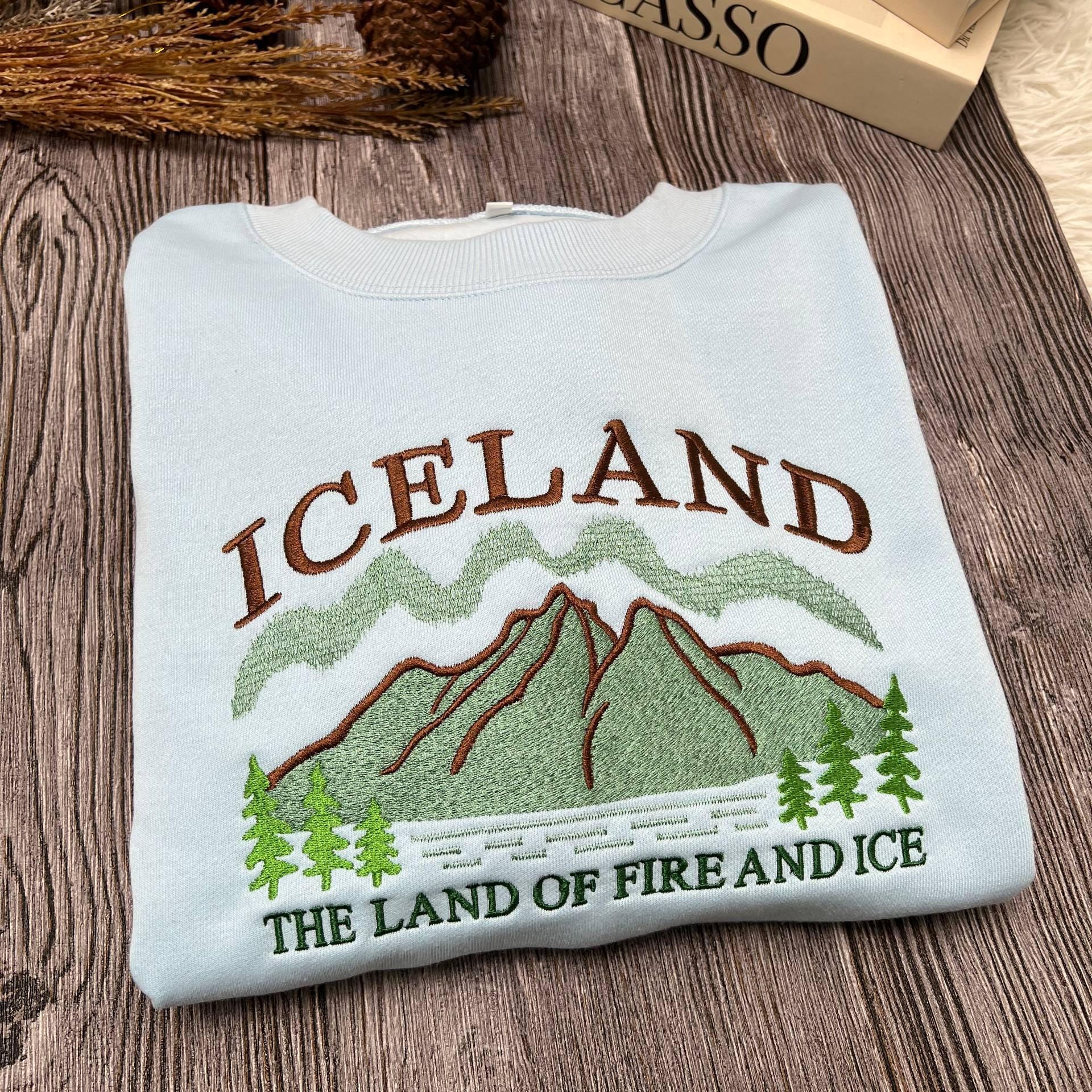 Iceland Embroidered Sweatshirt, Land of Fire and Ice Crewneck, Nordic Travel Sweater, Adventure Gift, Cozy Winter Travel Shirt